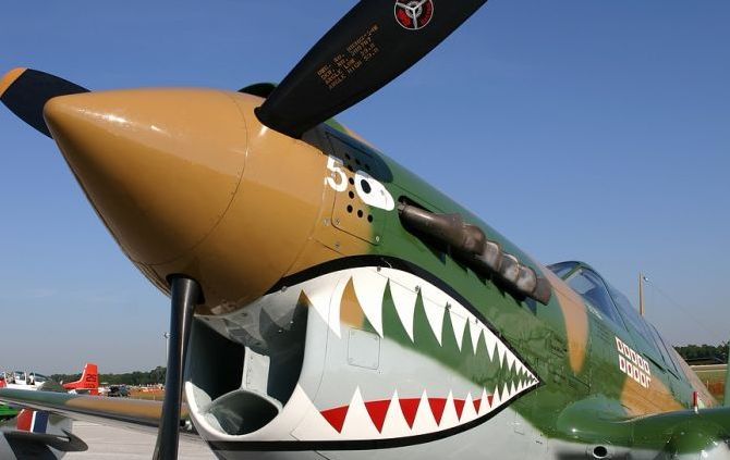 nose art painting of a military aircraft