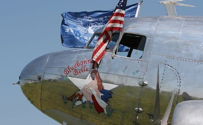 nose art painting of a military aircraft