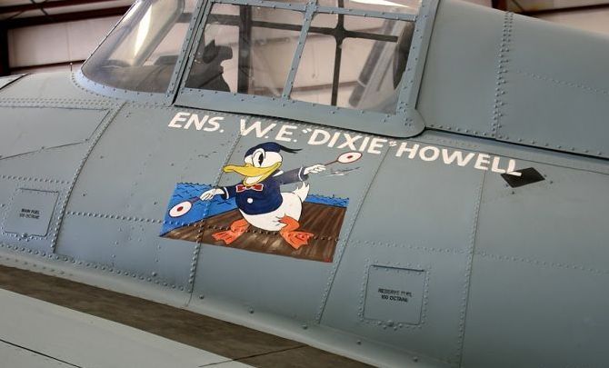 nose art painting of a military aircraft