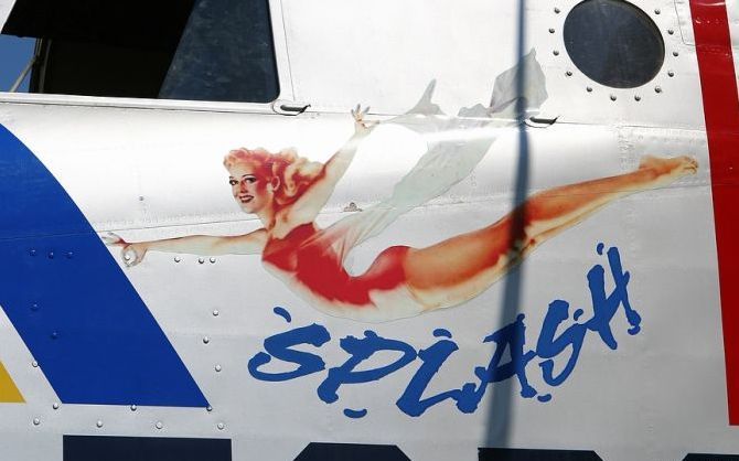 nose art painting of a military aircraft