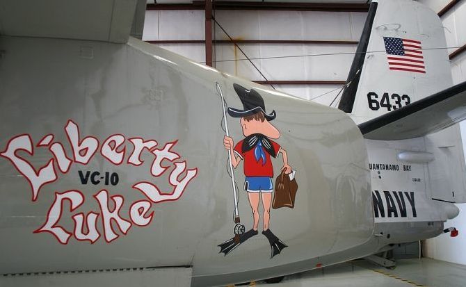 nose art painting of a military aircraft