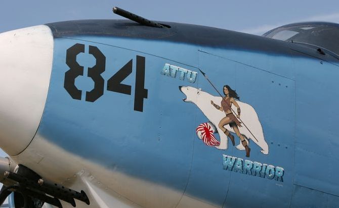 nose art painting of a military aircraft