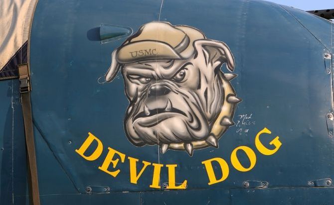 nose art painting of a military aircraft