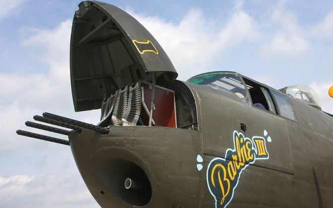 nose art painting of a military aircraft