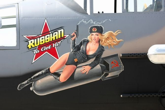 nose art painting of a military aircraft