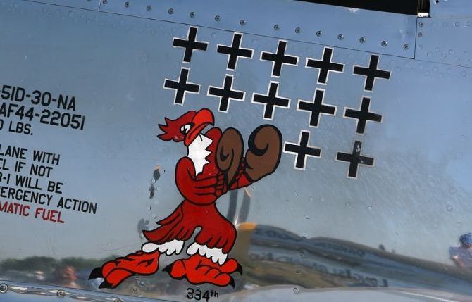 nose art painting of a military aircraft