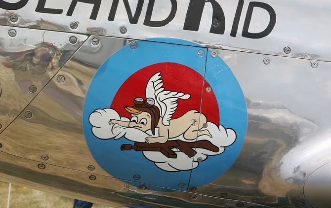 nose art painting of a military aircraft