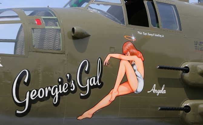 nose art painting of a military aircraft