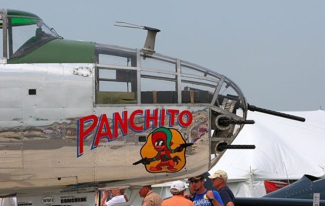 nose art painting of a military aircraft