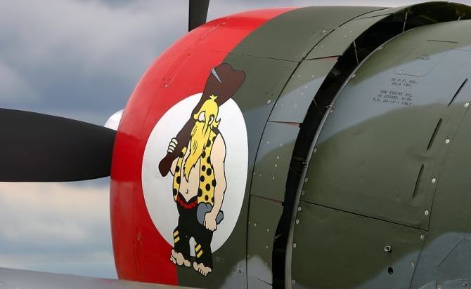 nose art painting of a military aircraft