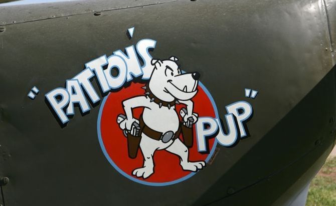 nose art painting of a military aircraft