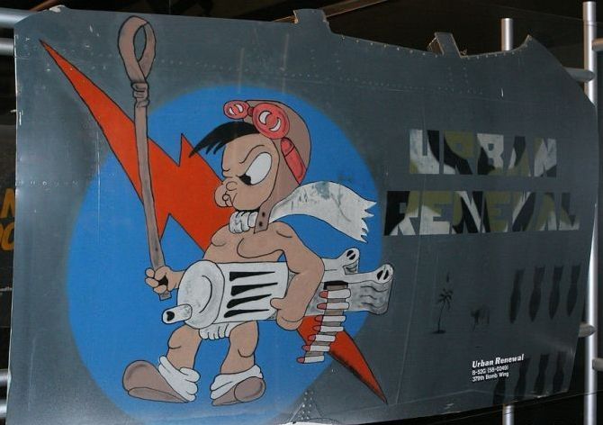 nose art painting of a military aircraft