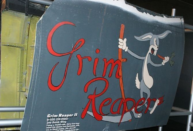 nose art painting of a military aircraft