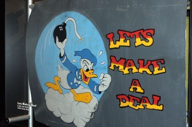 nose art painting of a military aircraft