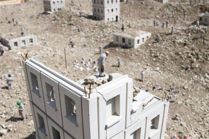 Follow the Leaders, A Corporate City in Ruins by Isaac Cordal, Place du Bouffay, Nantes, France