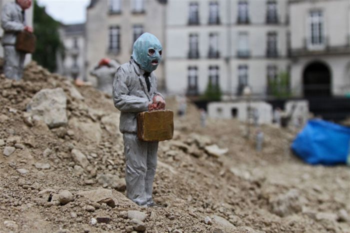 Follow the Leaders, A Corporate City in Ruins by Isaac Cordal, Place du Bouffay, Nantes, France