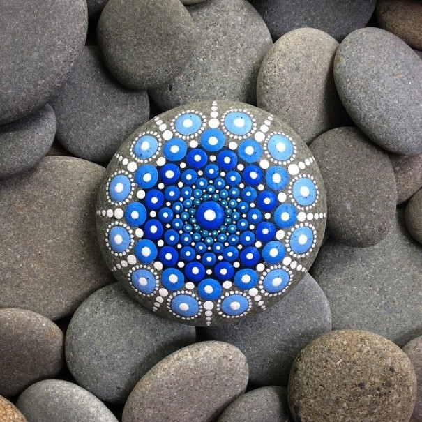 Mandala on ocean stones by Elspeth McLean