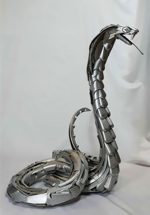 Hubcap sculpture creatures by Ptolemy Elrington