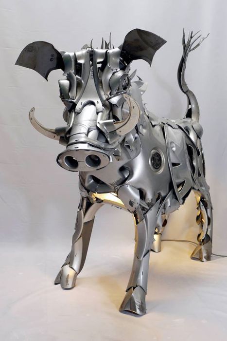 Hubcap sculpture creatures by Ptolemy Elrington