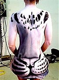 Art & Creativity: Body art girl with a leopard painting by Craig Tracy