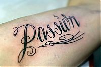 TopRq.com search results: typographic tattoos