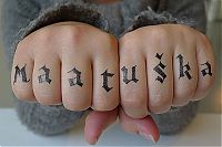 TopRq.com search results: typographic tattoos