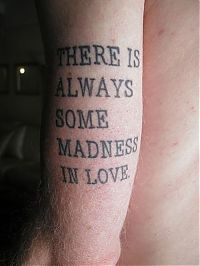 TopRq.com search results: typographic tattoos