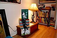 TopRq.com search results: artwork on spines of stacked books