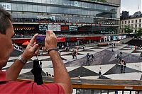 Art & Creativity: Mind your step illusion by Erik Johansson, Sergel's Square, Stockholm, Sweden