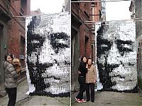 TopRq.com search results: portrait made of socks, bamboo sticks and pins