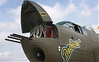 Art & Creativity: nose art painting of a military aircraft