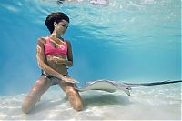 Mermaid and the stingray underwater photography by Christian Coulombe