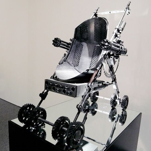 Stroller with machine guns