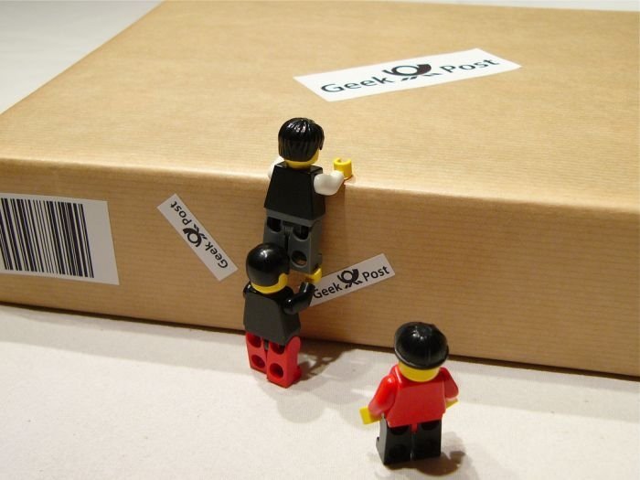 unpacking ipad with lego people