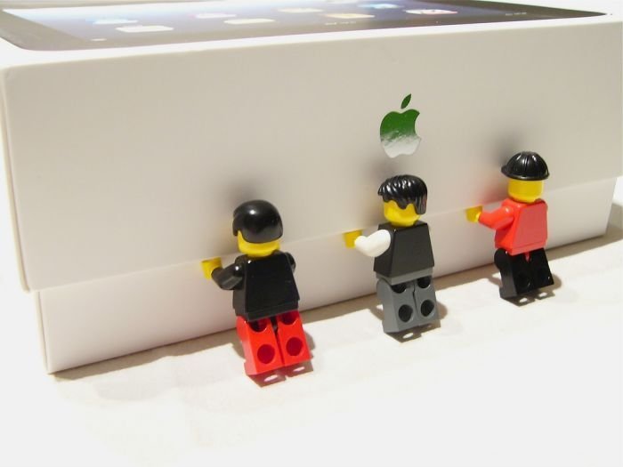 unpacking ipad with lego people