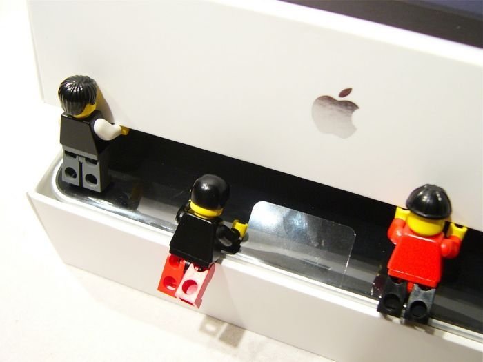 unpacking ipad with lego people