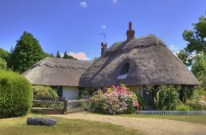 House with a beautiful thatch roof, England, United Kingdom