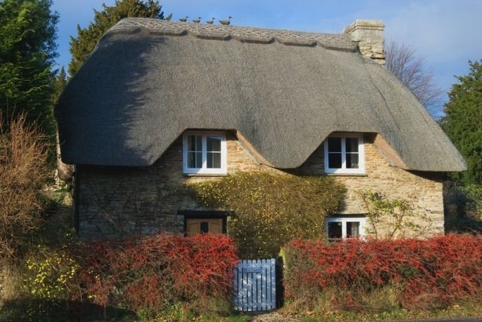 House with a beautiful thatch roof, England, United Kingdom