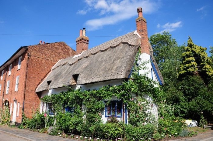 House with a beautiful thatch roof, England, United Kingdom