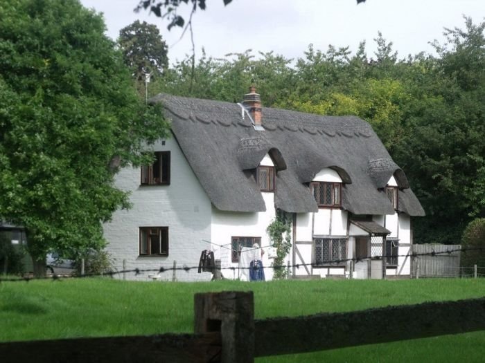 House with a beautiful thatch roof, England, United Kingdom