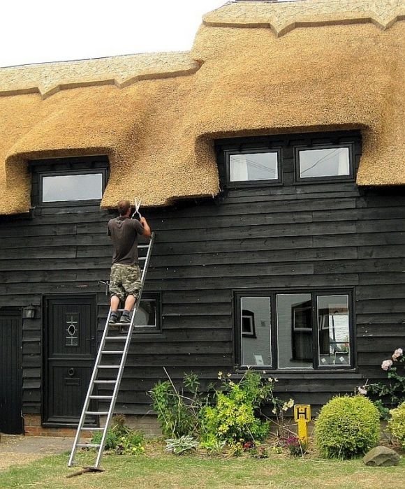 House with a beautiful thatch roof, England, United Kingdom