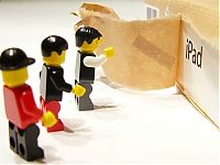 TopRq.com search results: unpacking ipad with lego people