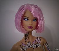 TopRq.com search results: modern barbie with tattoos