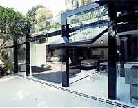 Architecture & Design: maserati glass residential garage