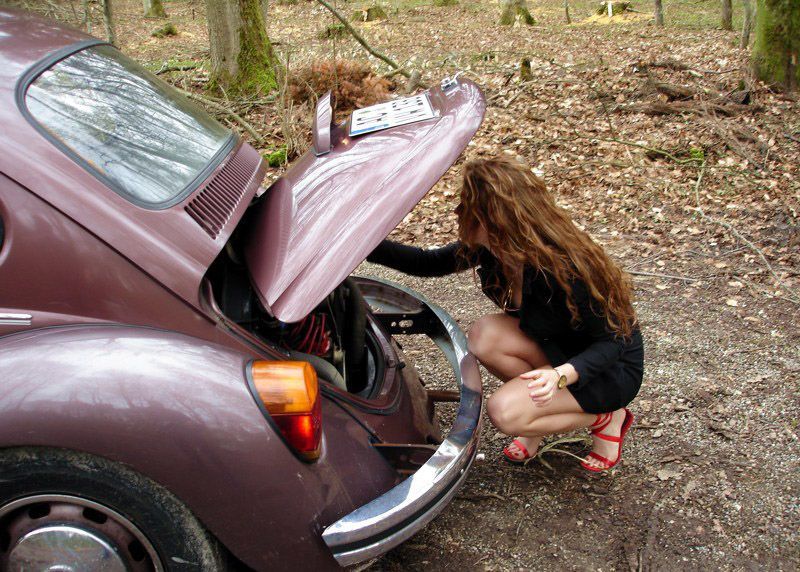 girl with old antique retro classic car