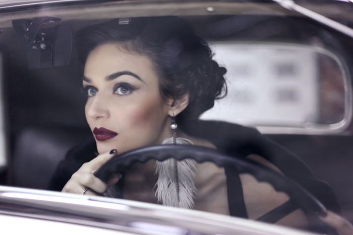 girl with old antique retro classic car