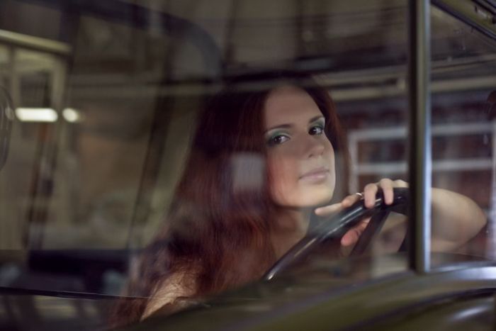 girl with old antique retro classic car