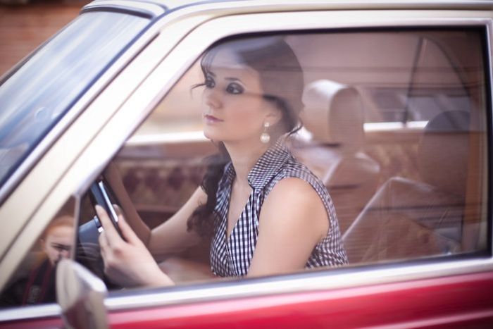 girl with old antique retro classic car