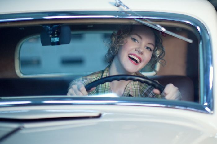 girl with old antique retro classic car