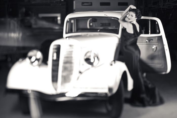 girl with old antique retro classic car